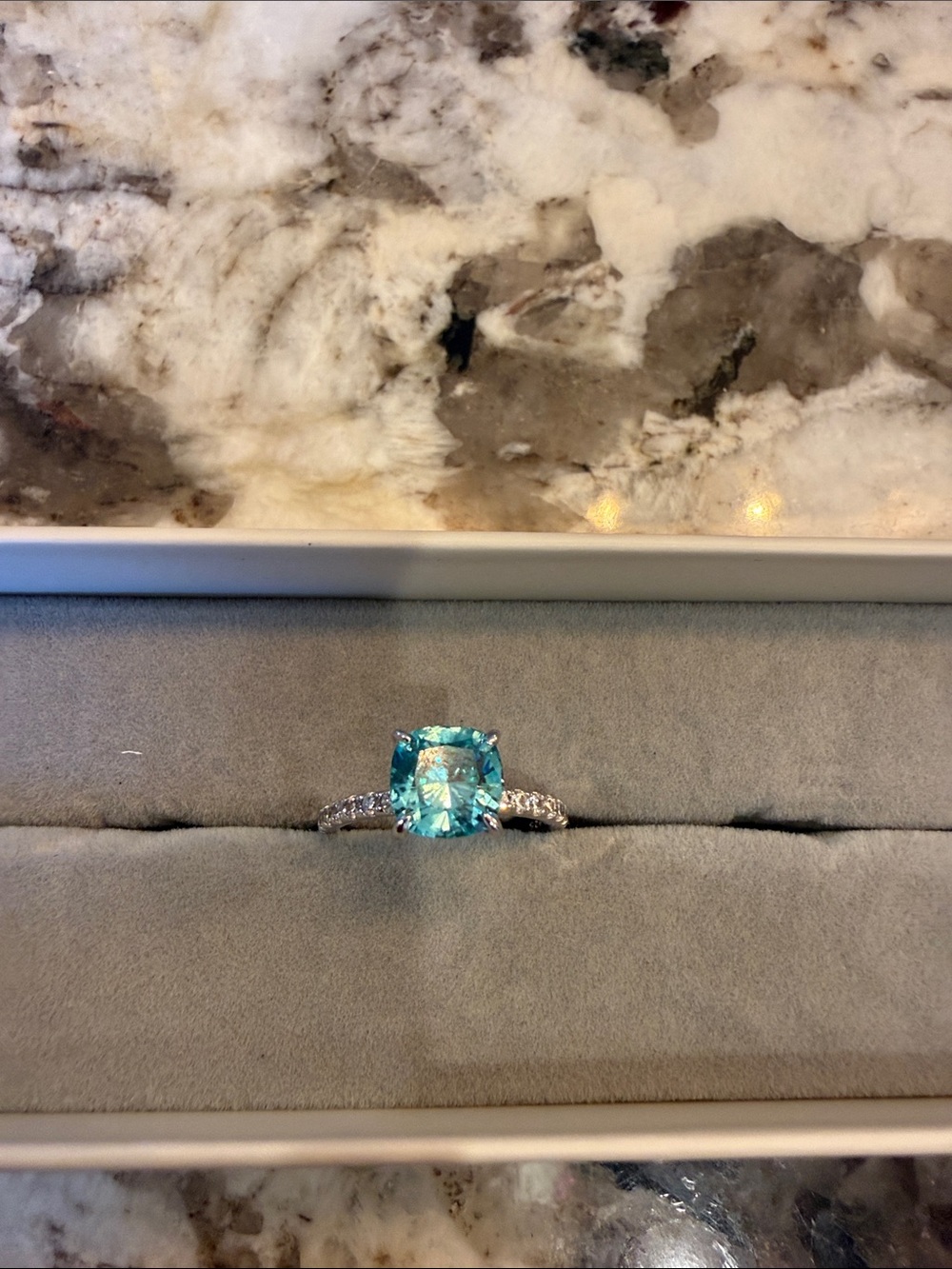 Sterling Silver Ring with Blue Cushion Gemstone and Diamond Accents